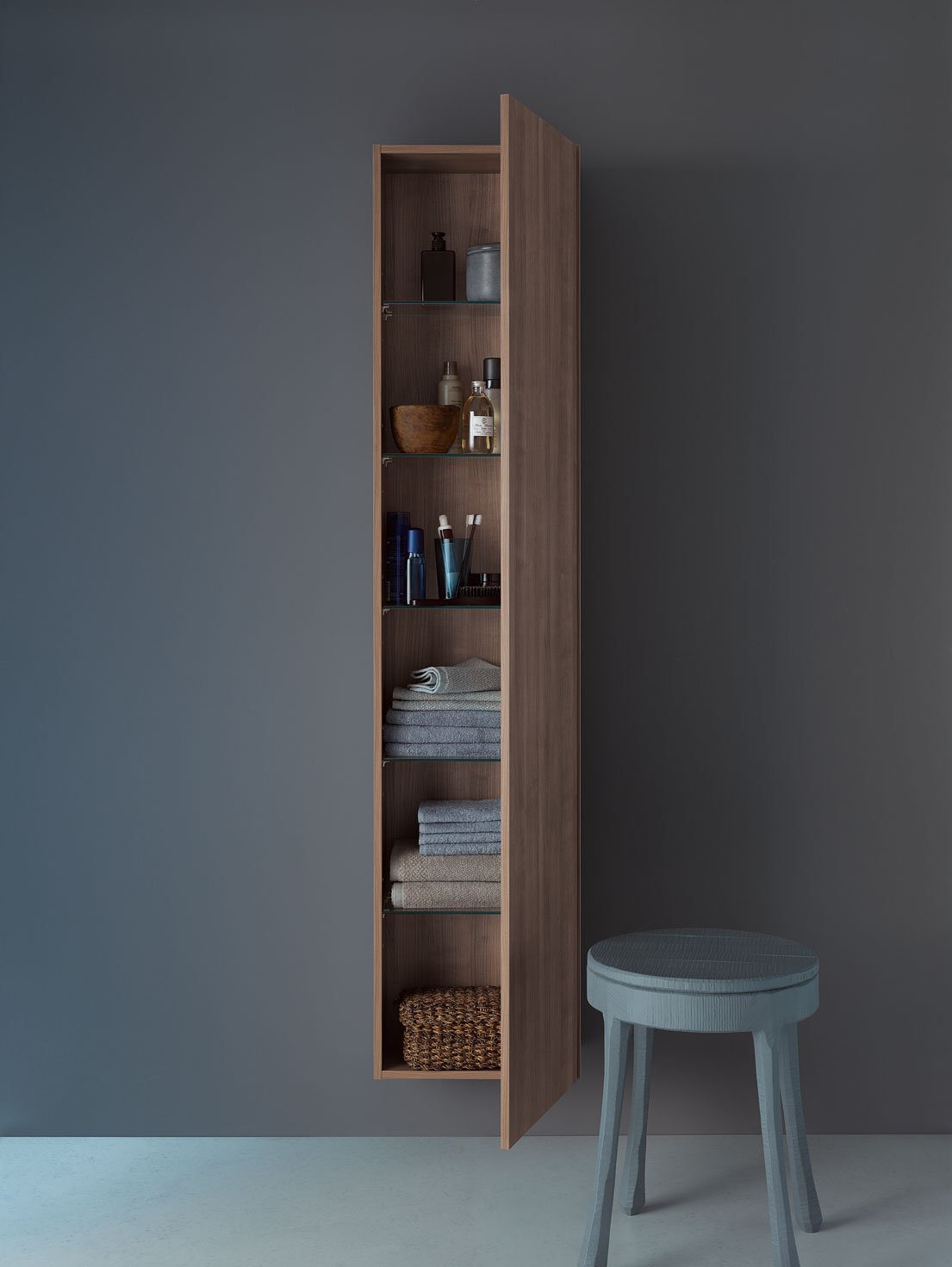 Tall cabinet with plenty of storage space for bathroom utensils

